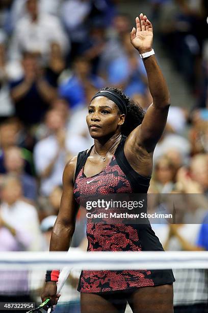 Serena Williams of the United States waves to the crowd after defeating Venus Williams of the United States in their Women's Singles Quarterfinals...