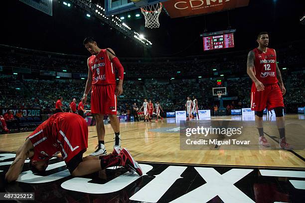 Juan Toscano of Mexico takes a breath after clashing with a teammate during a second stage match between Mexico and Canada as part of the 2015 FIBA...