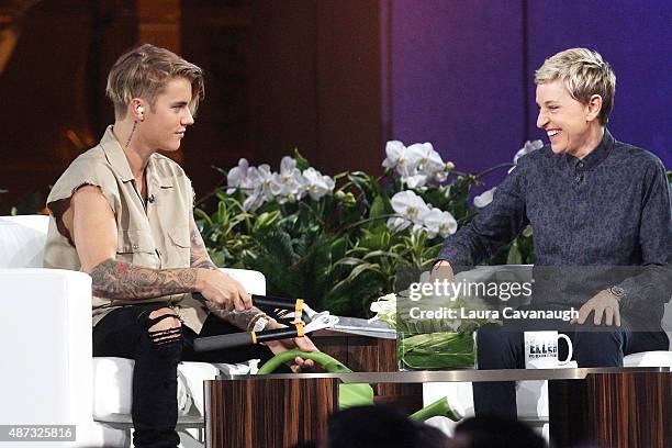 Justin Bieber and Ellen DeGeneres attend "The Ellen DeGeneres Show" Season 13 Bi-Coastal Premiere at Rockefeller Center on September 8, 2015 in New...