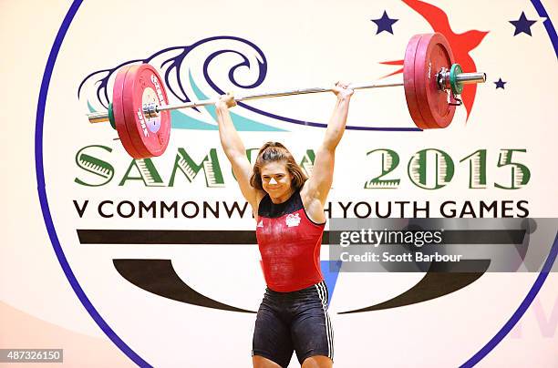 Rebekah Tiler of England competes in the Women 63kg, 69kg Weightlifting at the Tuanaimato Sports Facility on day three of the Samoa 2015 Commonwealth...