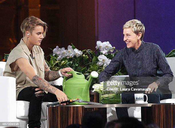 Justin Bieber and Ellen DeGeneres attend "The Ellen DeGeneres Show" Season 13 bi-coastal premiere at Rockefeller Center on September 8, 2015 in New...