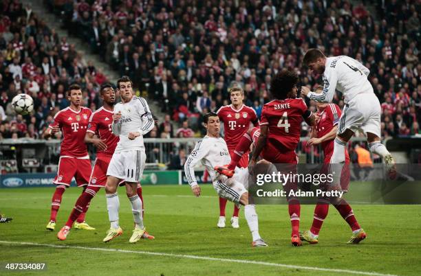 Sergio Ramos of Real Madrid score the first goall during the UEFA Champions League semi-final second leg match between FC Bayern Muenchen and Real...