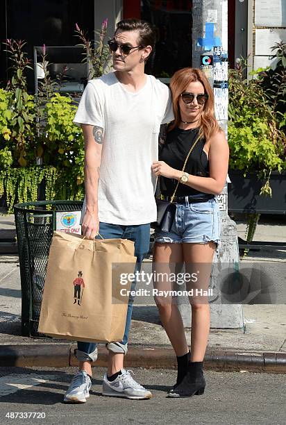 Actress Ashley Tisdale and Christopher French are seen walking in Soho on September 8, 2015 in New York City.