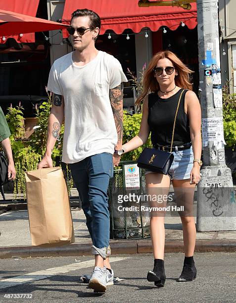 Actress Ashley Tisdale and Christopher French are seen walking in Soho on September 8, 2015 in New York City.