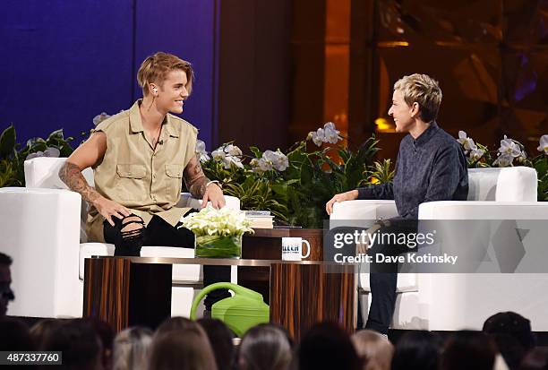 Justin Bieber and Ellen Degeneres appear at "The Ellen Degeneres Show" Season 13 Bi-Coastal Premiere at Rockefeller Center on September 8, 2015 in...