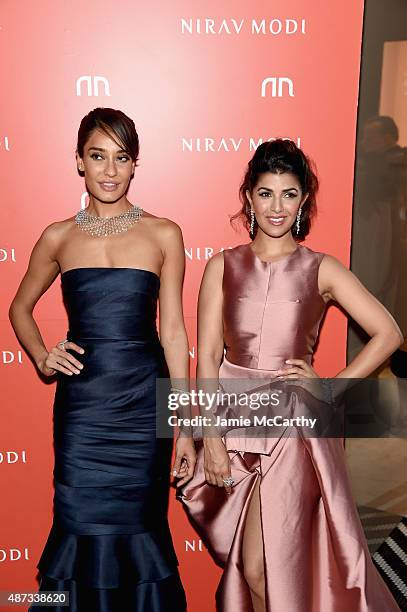 Lisa Haydon and Nimrat Kaur attend the Nirav Modi U.S. Boutique grand opening at Nirav Modi Boutique on September 8, 2015 in New York City.