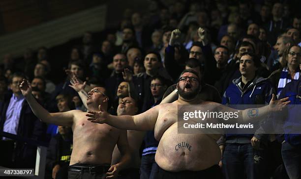 Two Wigan Athletic supporters look on during the Sky Bet Championship match between Birmingham City and Wigan Athletic at St Andrews Stadium on April...