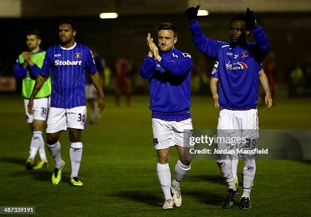 The Carlisle players clap their travelling fans at the end of the Sky Bet League One match between Crawley Town and Carlisle United at The...