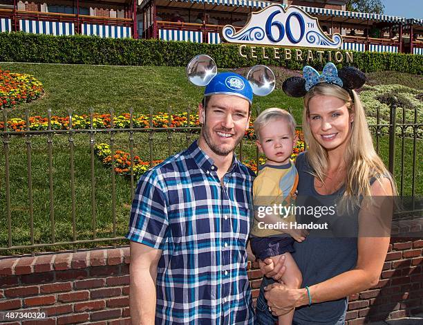 In this handout photo provided by Disney Parks, actor Mark-Paul Gosselaar, Dekker Gosselaar and Catriona McGinn visit Disneyland on September 08,...