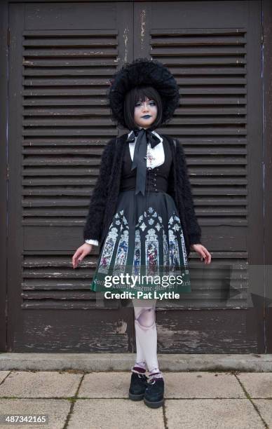 Sandy from Hong Kong wears a Japanese Gothic Lolita dress by Moi Meme Moite with a blouse by Alice And The Pirates, leggings, creepers, and bonnet...