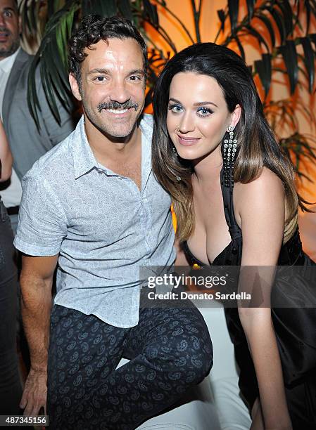 Tv personality George Kotsiopoulos and singer Katy Perry attend "Jeremy Scott - The People's Designer" afterparty hosted by The Rooftop at The...