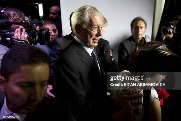 Peruavian 2010 Nobel Prize laurate Mario Vargas Llosa tours the International Book Fair of Bogota, which has Peru as guest of honor, on April 29 in...