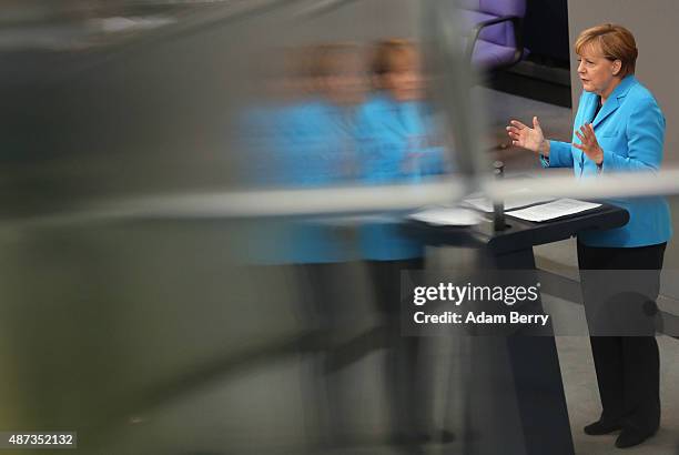 German Chancellor Angela Merkel speaks during a session of the Bundestag, the German parliament, on September 9, 2015 in Berlin, Germany. Merkel...
