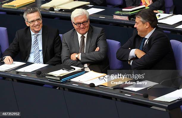 Interior Minister Thomas de Maiziere and Vice Chancellor and Economy and Energy Minister Sigmar Gabriel congratulate Foreign Minister Frank-Walter...
