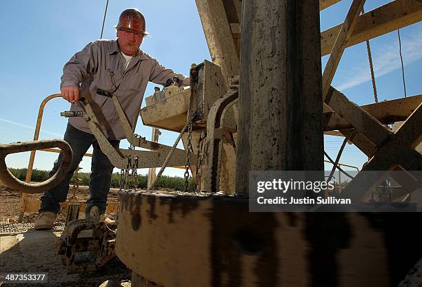 John Hicks with Arthur & Orum Well Drilling operates a well drilling a new well at a farm on April 29, 2014 near Mendota, California. As the...