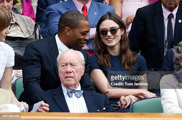Actor Chiwetel Ejiofor and actress Keira Knightly in the Royal Box during the womens singles final on Centre Court today during Wimbledon 2014 day 12...
