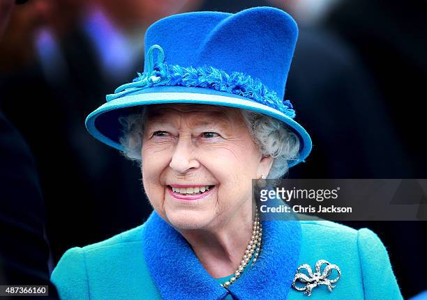 Queen Elizabeth II smiles as she arrives at Tweedbank Station on September 9, 2015 in Tweedbank, Scotland. Today, Her Majesty Queen Elizabeth II...