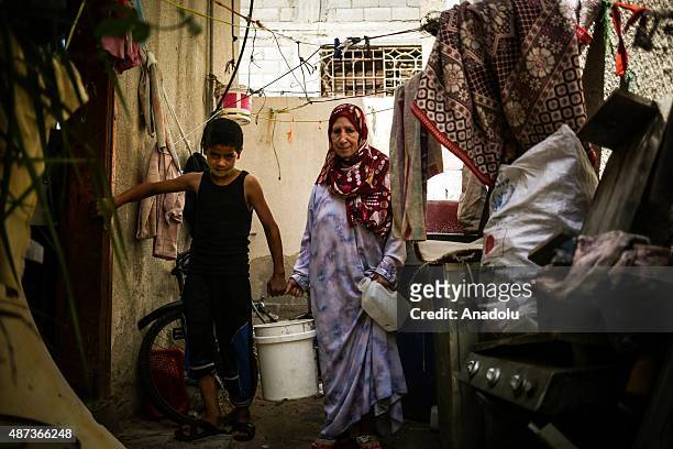 Boy carries a water bucket in Gaza City, Gaza on September 9, 2015. At least 120,000 Palestinians face water crisis just because infrastructure...