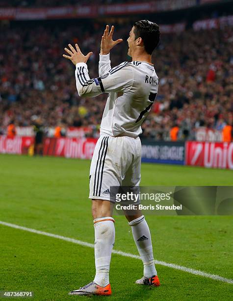 Cristiano Ronaldo of Real Madrid celebrates after scoring his team's third goal during the UEFA Champions League semi-final second leg match between...