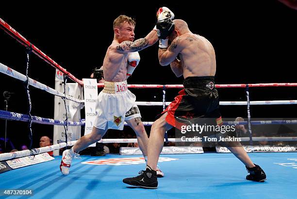 Frampton attacks in Carl Frampton v Kiko Martinez IBF world super-bantamweight title fight in the Titanic Quarter on September 6th 2014 in Belfast