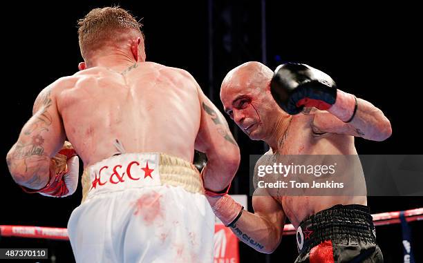 Bloodied Martinez during Carl Frampton v Kiko Martinez IBF world super-bantamweight title fight in the Titanic Quarter on September 6th 2014 in...