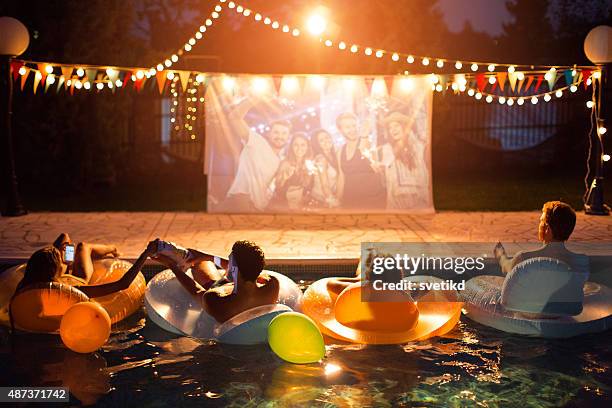 pool movie night party. - video 個照片及圖片檔