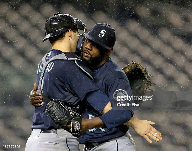 Fernando Rodney of the Seattle Mariners celebrates the win with teammate Mike Zunino after the game against the New York Yankees on April 29, 2014 at...