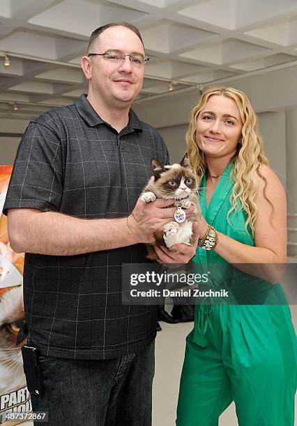 Bryan Bundesen, owner Tabatha Bundesen and Grumpy Cat attend Grumpy Cat's "Grumpiest" Birthday Bash at 404 10th Avenue on April 29, 2014 in New York...