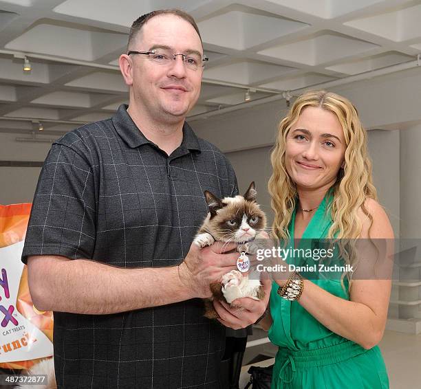 Bryan Bundesen, owner Tabatha Bundesen and Grumpy Cat attend Grumpy Cat's "Grumpiest" Birthday Bash at 404 10th Avenue on April 29, 2014 in New York...