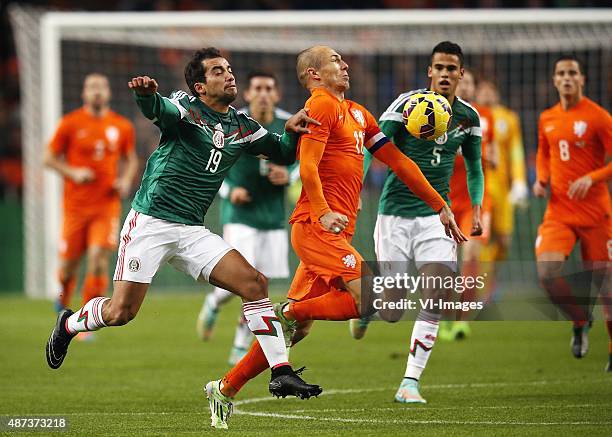 Arjen Robben of the Netherlands, Adrien Aldrete of Mexico during the International friendly match between Netherlands and Mexico on November 12, 2014...