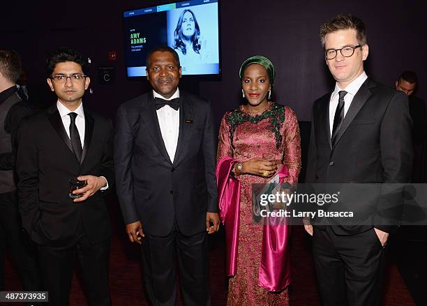 Honoree Aliko Dangote and Halima Dangote pose with guests at the TIME 100 Gala, TIME's 100 most influential people in the world, at Jazz at Lincoln...