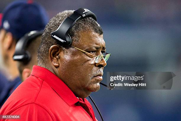 Defensive Coordinator Romeo Crennel of the Houston Texans watches on the sidelines during a preseason game against the Dallas Cowboys at AT&T Stadium...