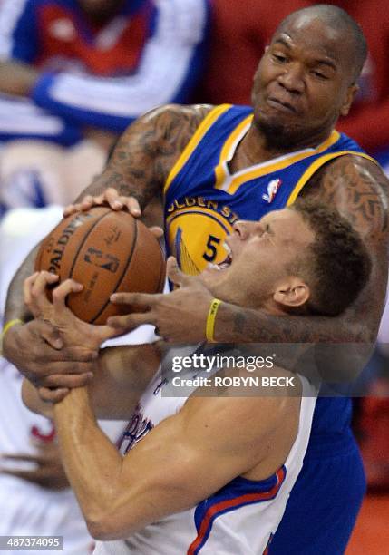 Blake Griffith of the Los Angeles Clippers is fouled by Marreese Speights of the Golden State Warriors during Game 5 of their NBA playoff game April...