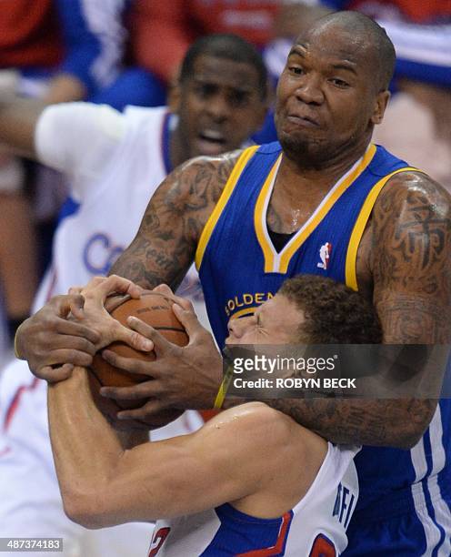 Blake Griffith of the Los Angeles Clippers is fouled by Marreese Speights of the Golden State Warriors during Game 5 of their NBA playoff game April...