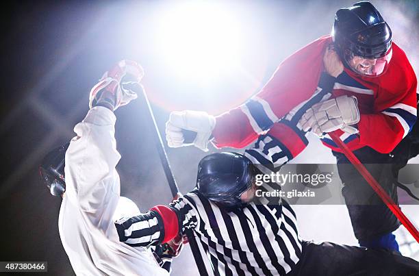 ice hockey fight. - hockey referee stock pictures, royalty-free photos & images