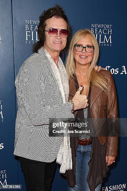 Glenn Hughes and Regina Russell attend the 2014 Newport Beach Film Festival World Premiere of yhe Quiet Riot documentary "Well Now You're Here,...