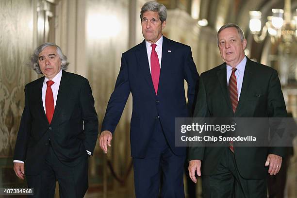 Energy Secretary Ernest Moniz, Secretary of State John Kerry and Senate Minority Whip Richard Durbin leave after meeting with members of Congress at...