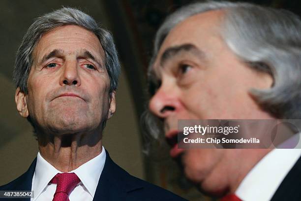 Secretary of State John Kerry and Energy Secretary Ernest Moniz talk to reporters after meeting with members of Congress at the U.S. Capitol...