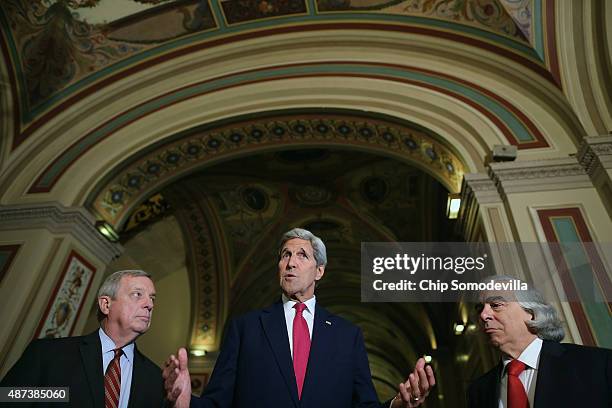 Senate Minority Whip Richard Durbin , Secretary of State John Kerry and U.S. Energy Secretary Ernest Moniz leave after meeting with members of...