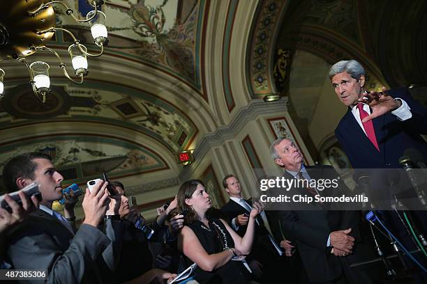 Secretary of State John Kerry answers reporters' questions after meeting with Senate Minority Whip Richard Durbin and other members of Congress at...