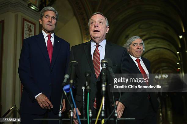 Secretary of State John Kerry, Senate Minority Whip Richard Durbin and U.S. Energy Secretary Ernest Moniz talk with reporters after meeting with...