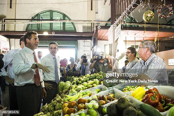 New York State Governor Andrew Cuomo visits a market in Old San Juan, Puerto Rico, with the Governor of the Commonwealth of Puerto Rico , Alejandro...