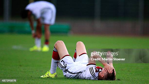 Davide Jerome Itter of U17 Germany look dejected during the match between U17 Germany v U17 Italy at Weserstadion "Platz 11" on September 9, 2015 in...