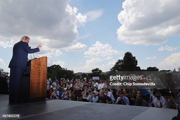 Republican presidential candidate Donald Trump addresses a rally against the Iran nuclear deal on the West Lawn of the U.S. Capitol September 9, 2015...