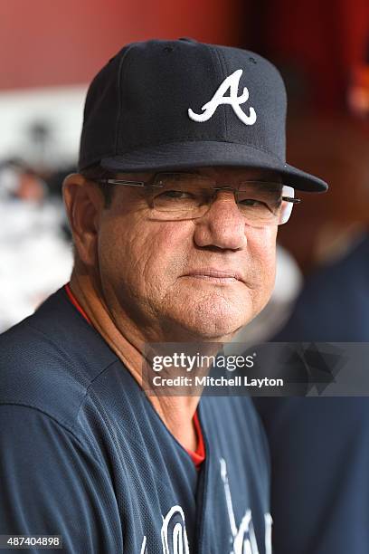 Bench coach Carlos Tosca of the Atlanta Braves looks on before a baseball game against the Washington Nationals at Nationals Park on September 5,...