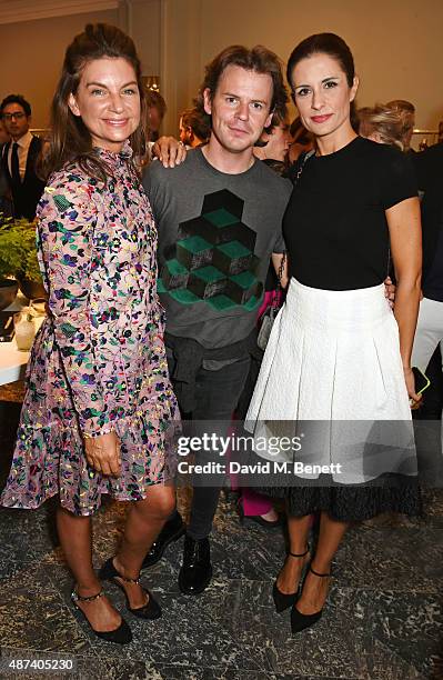 Natalie Massenet, Christopher Kane and Livia Firth attend the launch of the first Erdem flagship store on September 9, 2015 in London, England.