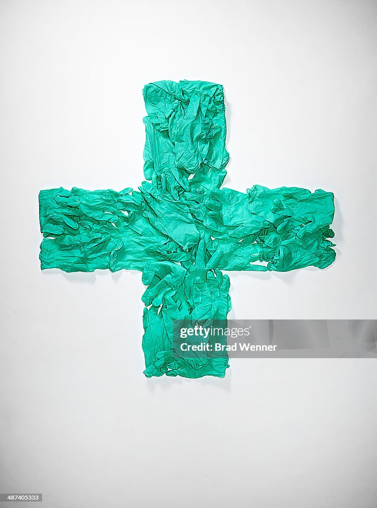 Cross of Medical of Sanitary Gloves