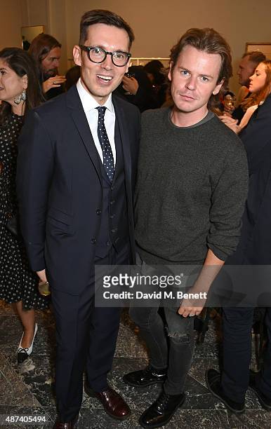 Designers Erdem Moralioglu and Christopher Kane attend the launch of the first Erdem flagship store on September 9, 2015 in London, England.