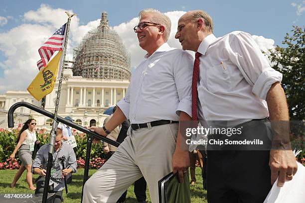 Conservative pundit Glenn Beck listens to Rep. Louie Gohmert before taking the stage during a rally against the Iran nuclear deal on the West Lawn of...