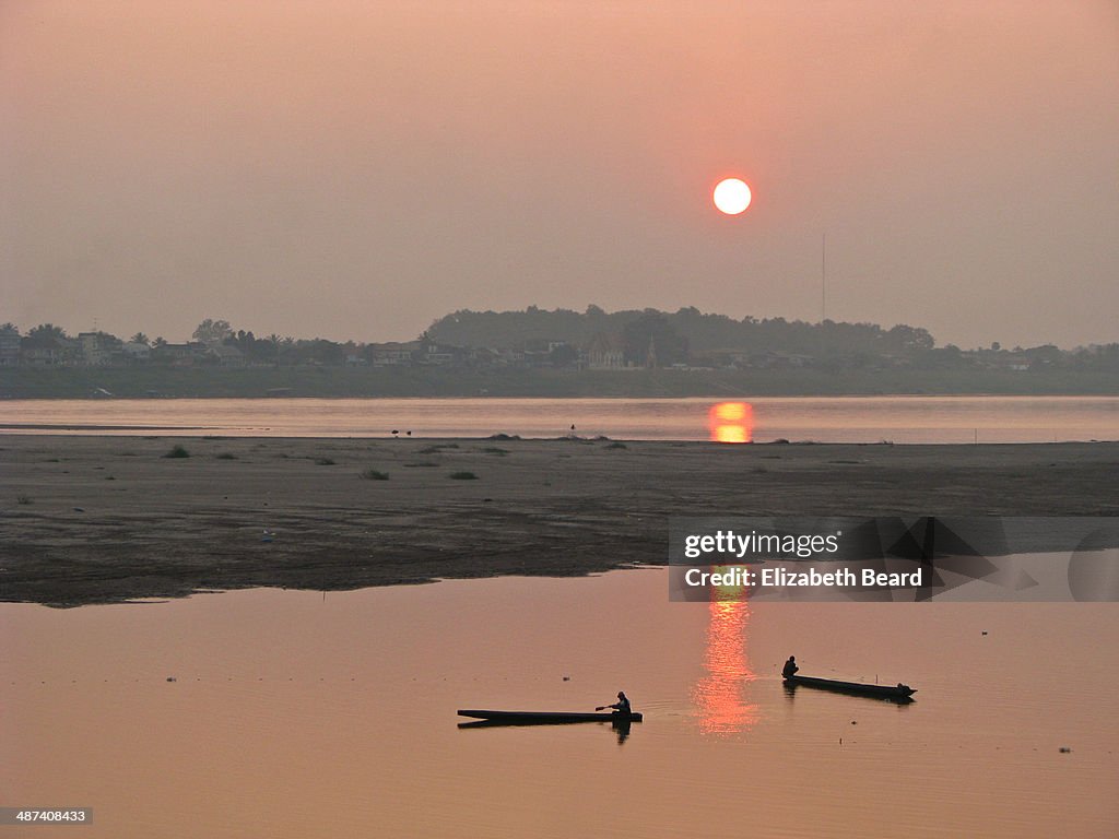 Fishing at sunset, Mekong River
